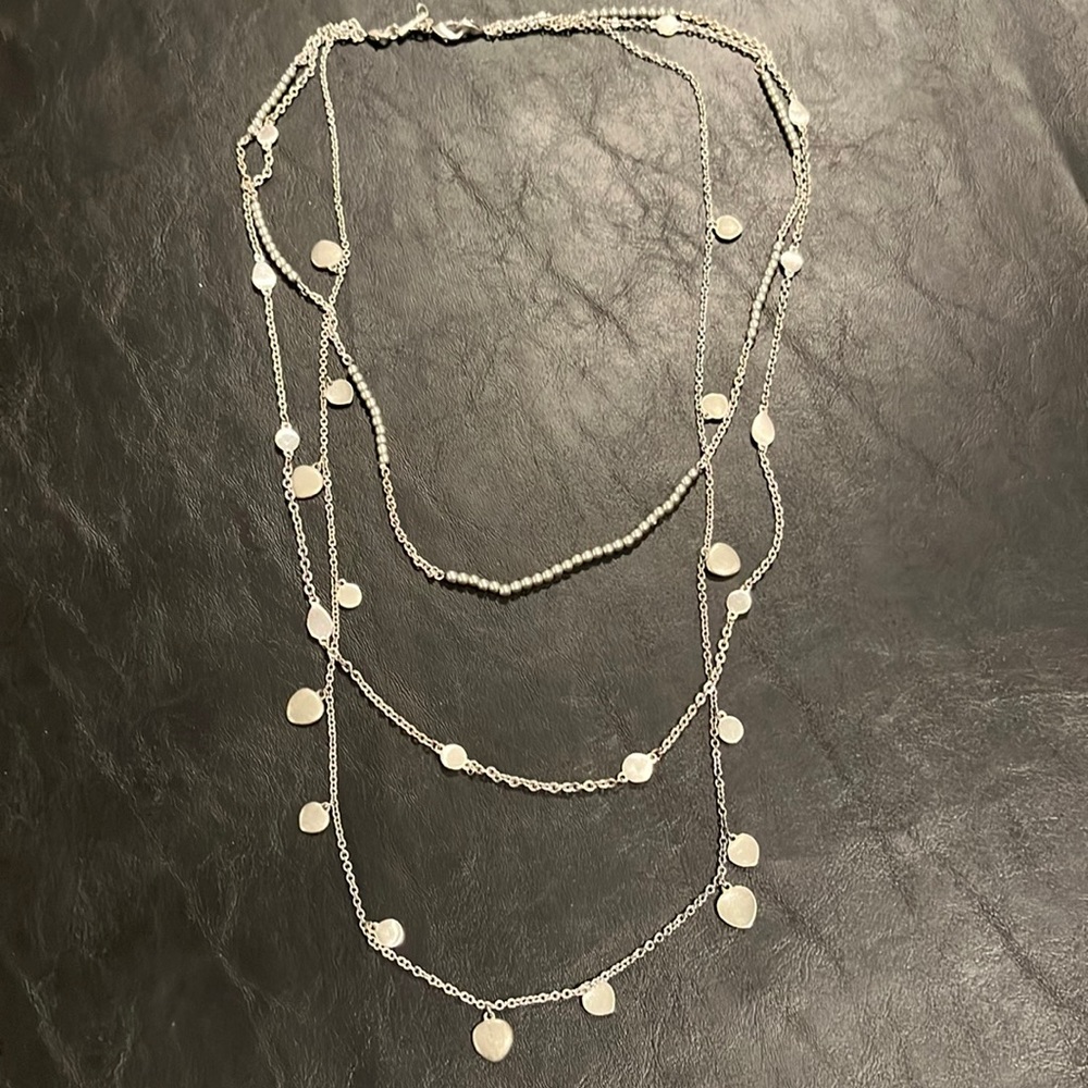 Premier brand 3 chain necklace in silver color